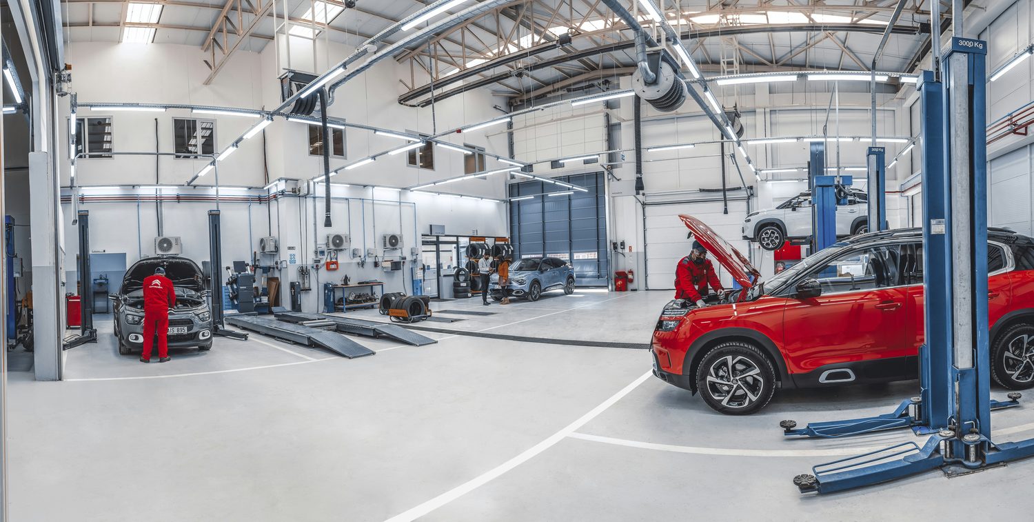 Vehicles in a modern service bay